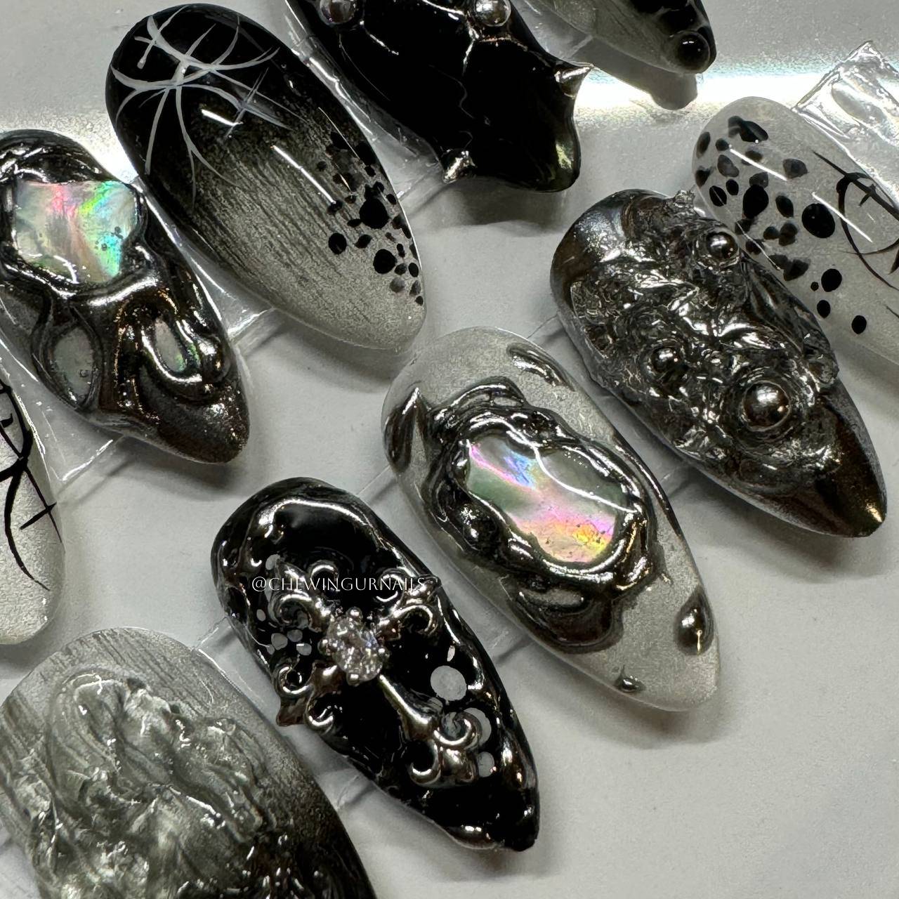 Decorative nail art designs on a white surface